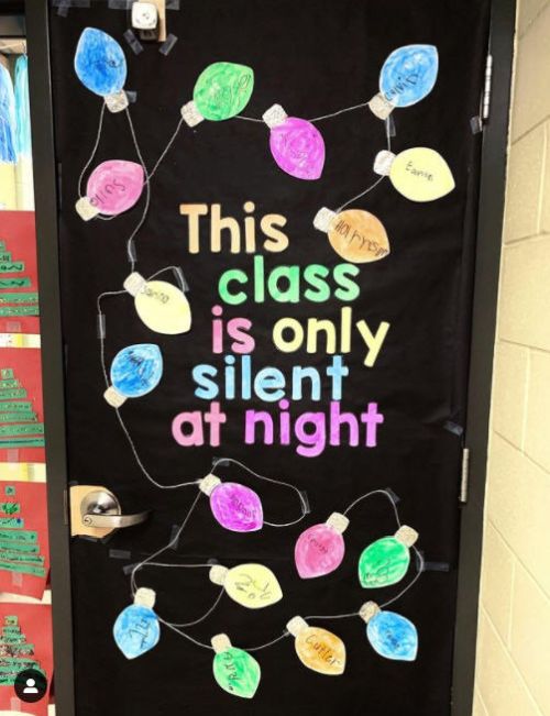 Classroom door with paper lights and text reading This class is only silent at night.