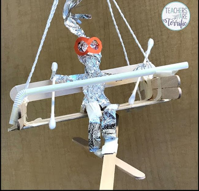 Toy ski lift built from straws, wood craft sticks, and string (Winter Olympics Activities)