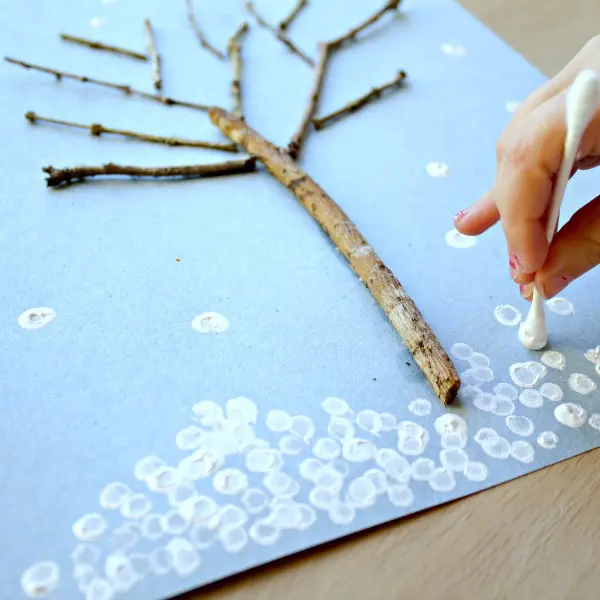 winter tree image using sticks and white paint 