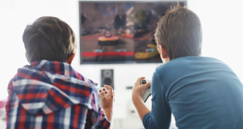 Young boys playing video games