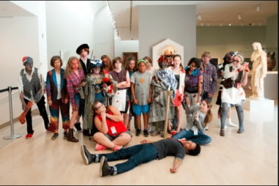 a group of teens dressed up like zombies